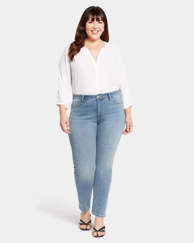 Front of a model wearing a size 14W High Rise Marilyn Ankle Jean in Lovesick by NYDJ. | dia_product_style_image_id:296151